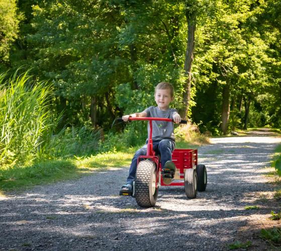 boy-riding-tricycle-with-wagon